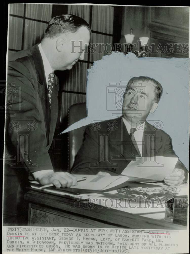 1953 Press Photo Martin Durkin and George Brown works at Washington desk.- Historic Images