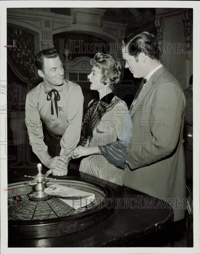 1958 Press Photo Carole Matthews, actress, with film co-stars - hpa84649- Historic Images