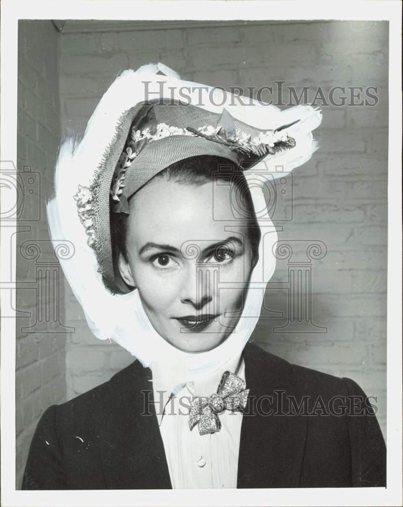 1955 Press Photo Woman modeling a fashionable hat. - hpa85488- Historic Images