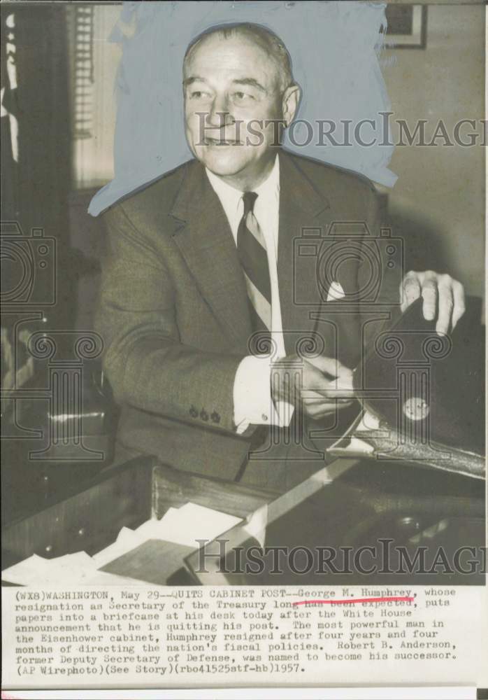 1957 Press Photo George Humphrey, Treasury Secretary, packs his briefcase in DC- Historic Images