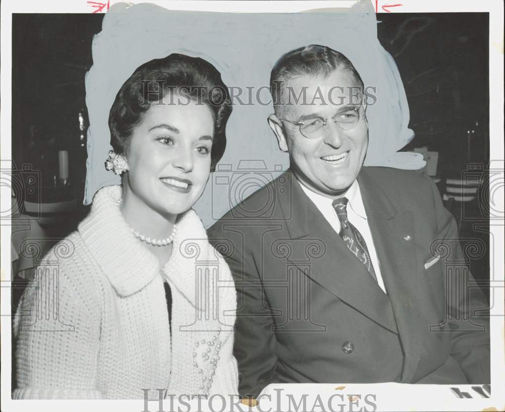 1955 Press Photo Kendall Baker attends party with Miss America Sharon Ritchie.- Historic Images