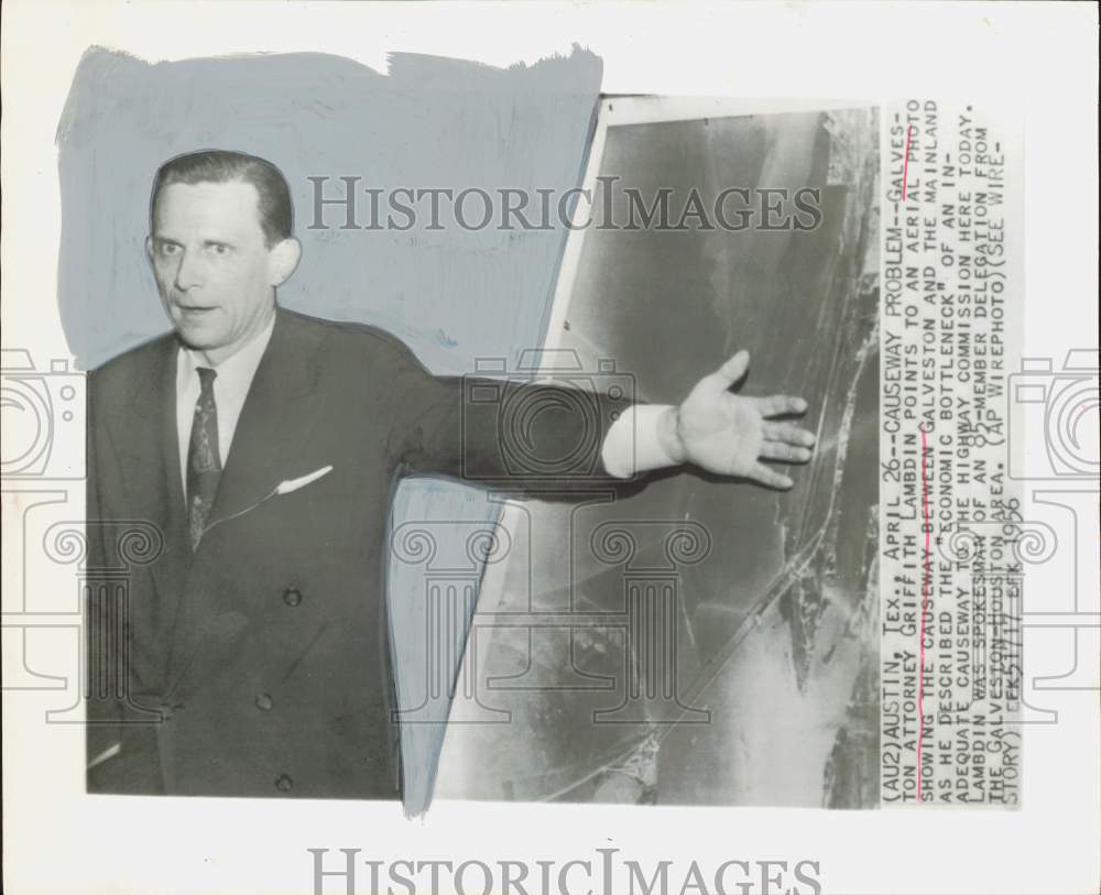 1956 Press Photo Griffith Lambdin points to Galveston-Mainland causeway photo.- Historic Images