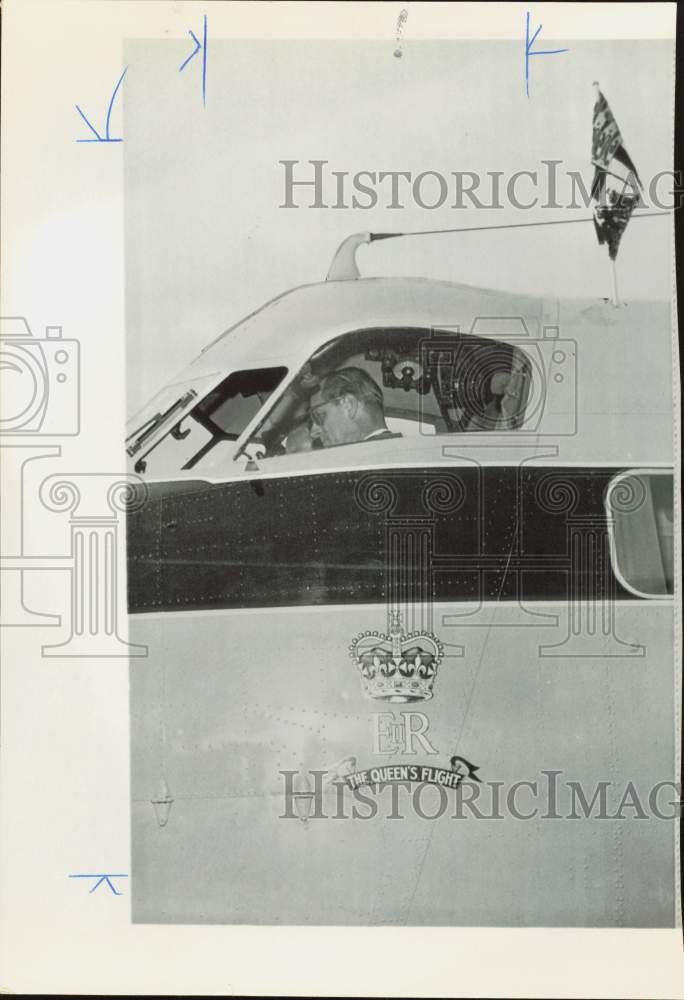 1962 Press Photo Prince Philip at Queen&#39;s Flight aircraft controls in Montreal- Historic Images