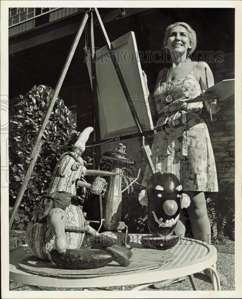 1969 Press Photo Woman with Sculptures Made from Vegetables - hpa89599- Historic Images