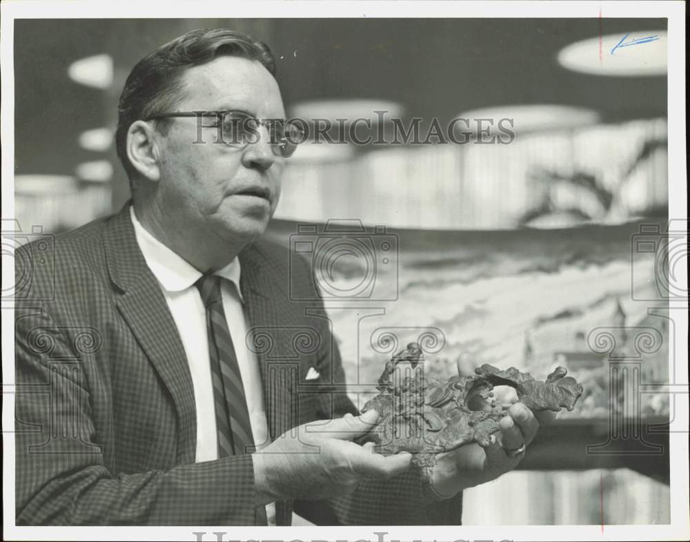 1962 Press Photo William J. Brinkmann III Shows Pennies Fused By Chicago Fire- Historic Images