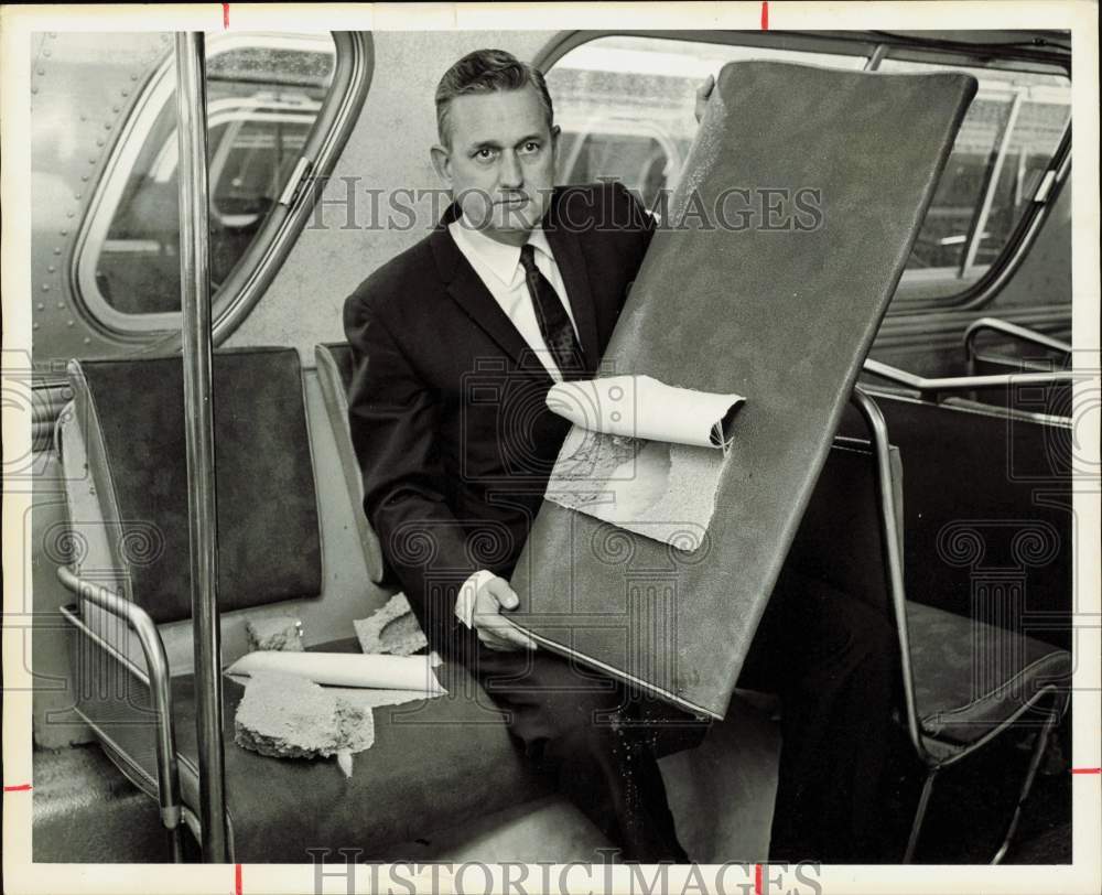 1967 Press Photo Stanley Gates Shows Evidence of Buses Vandalized by Students- Historic Images