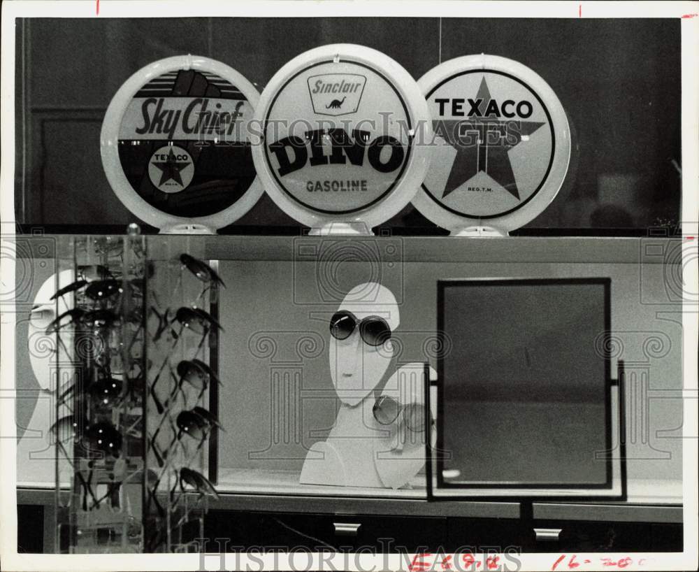 1977 Press Photo Antique Signs from Atop Gas Station Pumps - hpa90378- Historic Images