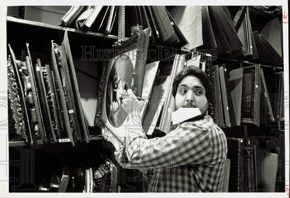 1979 Press Photo Sotheby Auction Employee Handles One of Works of Art on File- Historic Images