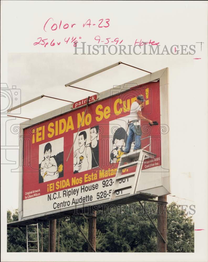 1991 Press Photo Hispanic AIDS Coalition puts sign in Hispanic community.- Historic Images