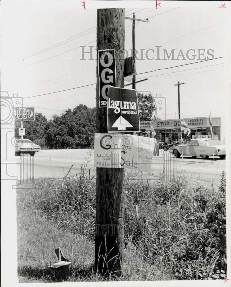 1972 Press Photo Signs posted on power pole. - hpa91763- Historic Images