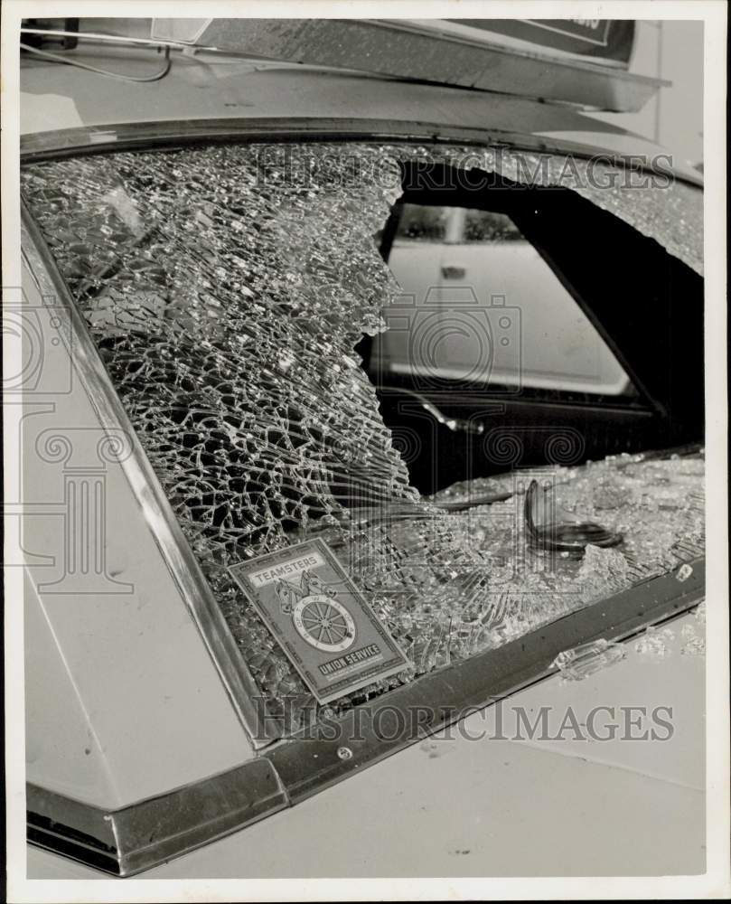 1967 Press Photo Cab with union seal with smashed rear window. - hpa91964- Historic Images