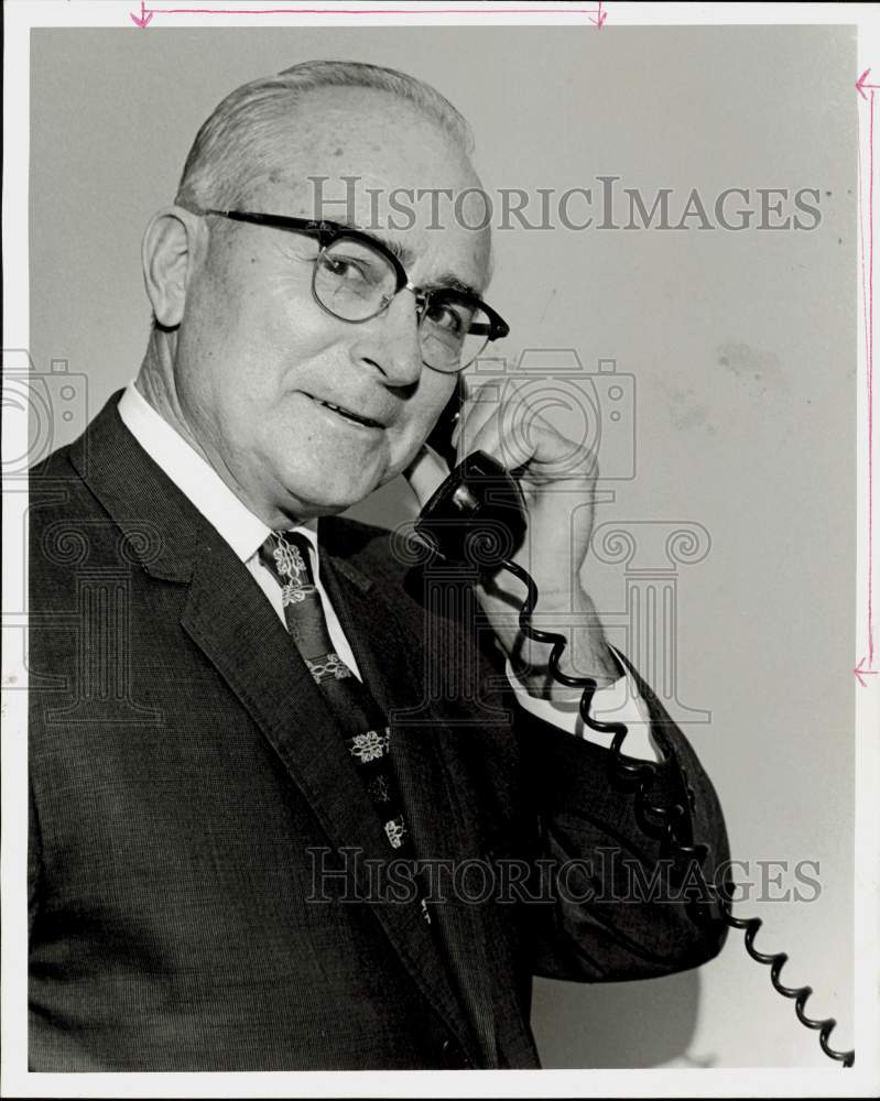 1969 Press Photo Glenn Fletcher, HISD superintendent talks on telephone.- Historic Images