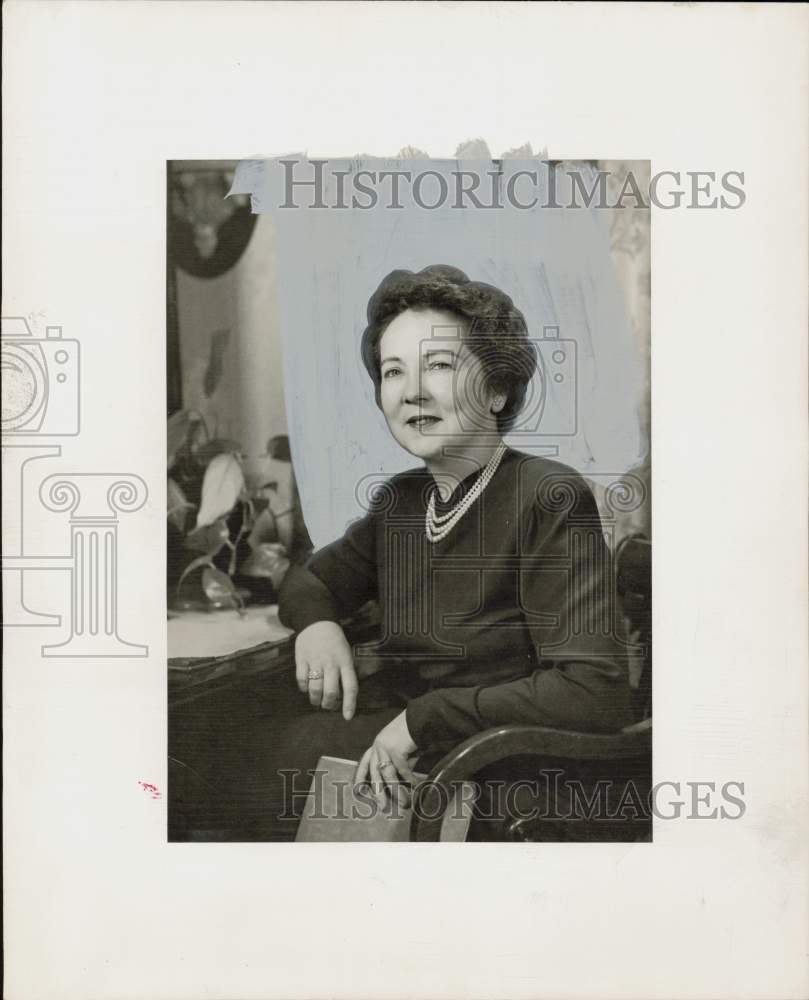 1957 Press Photo Mrs. Carl G. Stearns sits at desk. - hpa92093- Historic Images