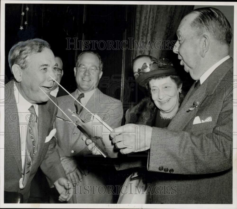 1950 Press Photo Chairman Francis Law of First City National Bank reads scroll- Historic Images