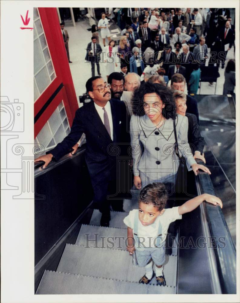 1990 Press Photo Jarrett Leland leads way up escalator ot Mickey Leland building- Historic Images