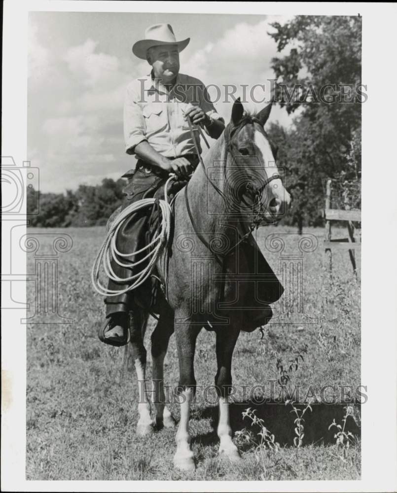 1958 Press Photo Reese Lockett, Brenham, Texas Mayor rides horse. - hpa93164- Historic Images