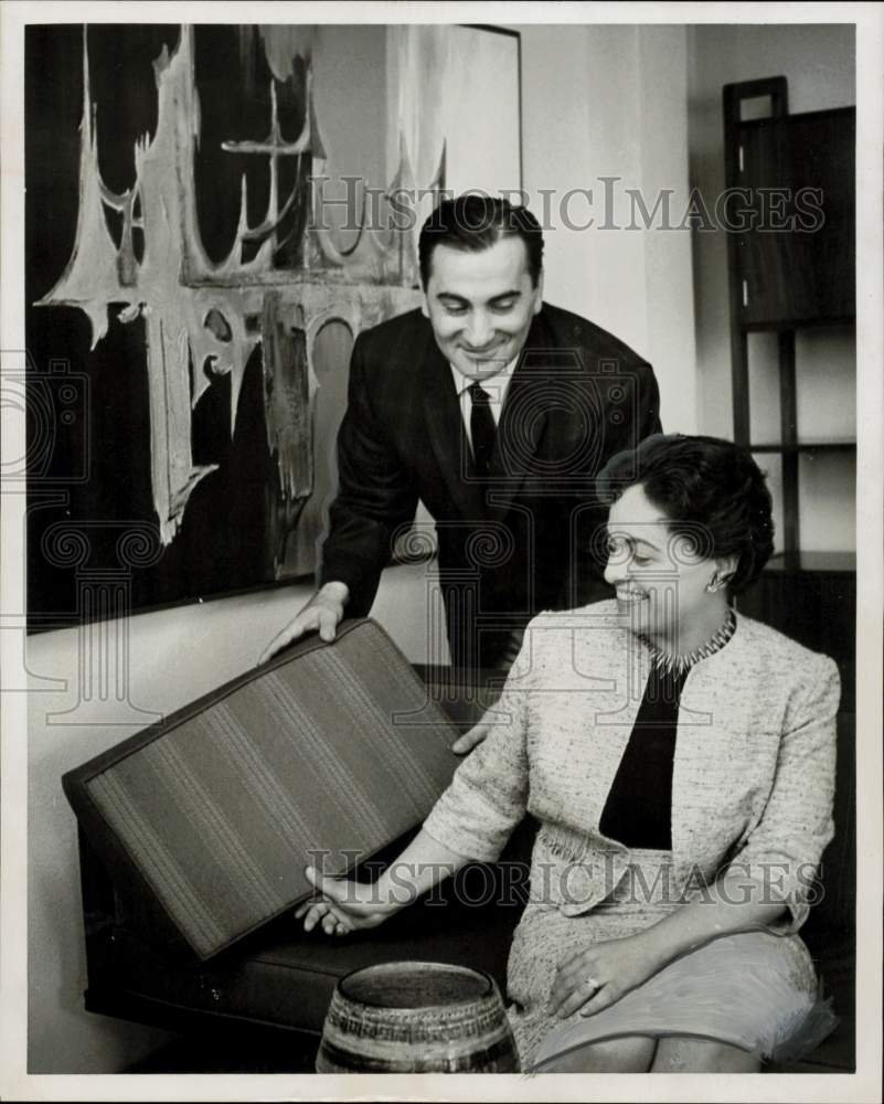 1963 Press Photo Mr. and Mrs. Sam Frankoff examine House of Loungers furniture.- Historic Images