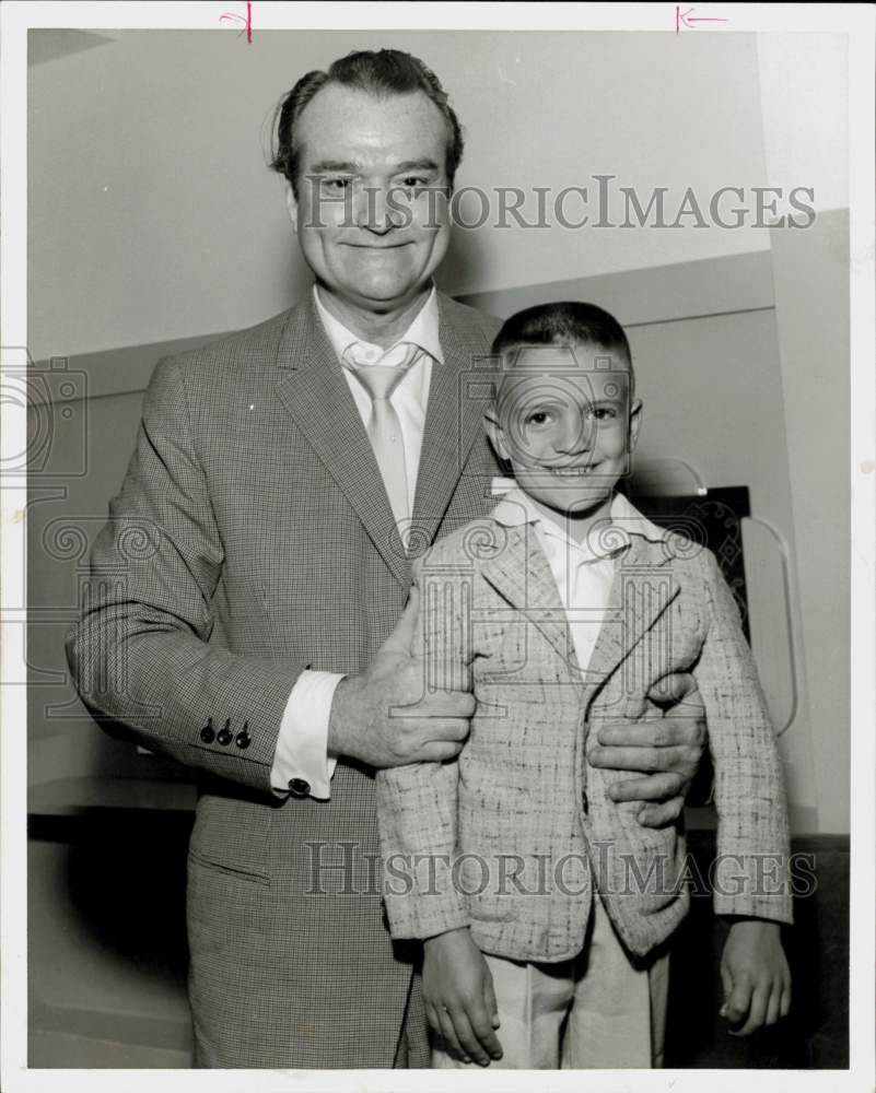 1960 Press Photo Red Skelton poses with young Bradley Cole. - hpa93400- Historic Images