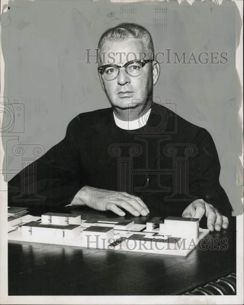 1959 Press Photo Father John F. Murphy with Saint Thomas expansion plans.- Historic Images