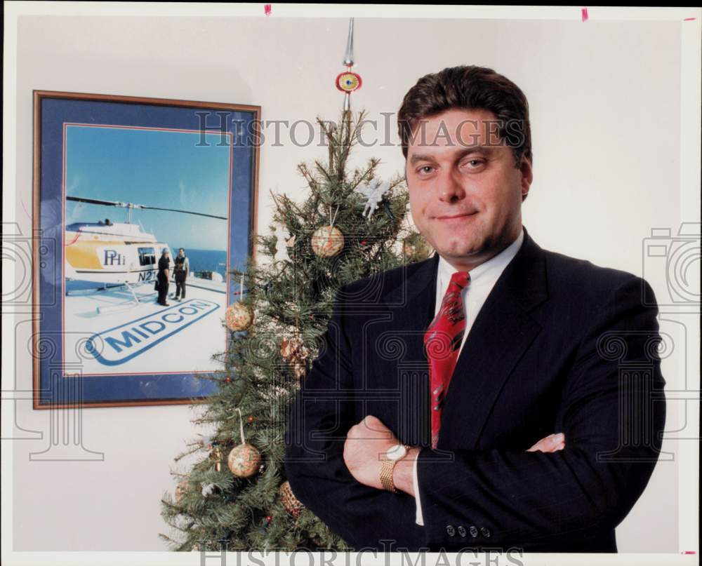 1993 Press Photo John Ehrman, Midcon President, poses in his office. - hpa94012- Historic Images