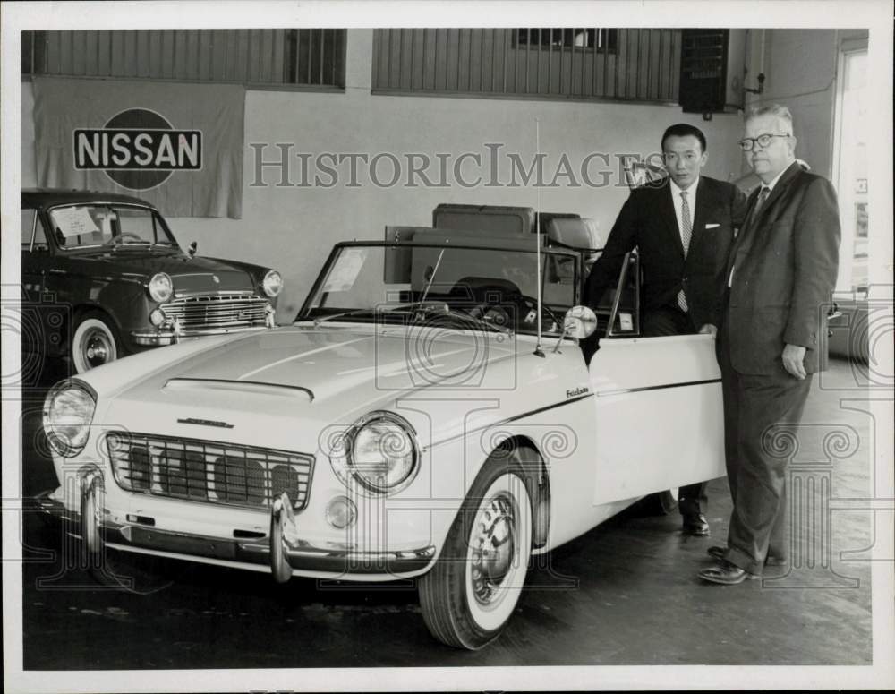 1963 Press Photo Nissan Motor Company officials display Datsun Fairlady.- Historic Images