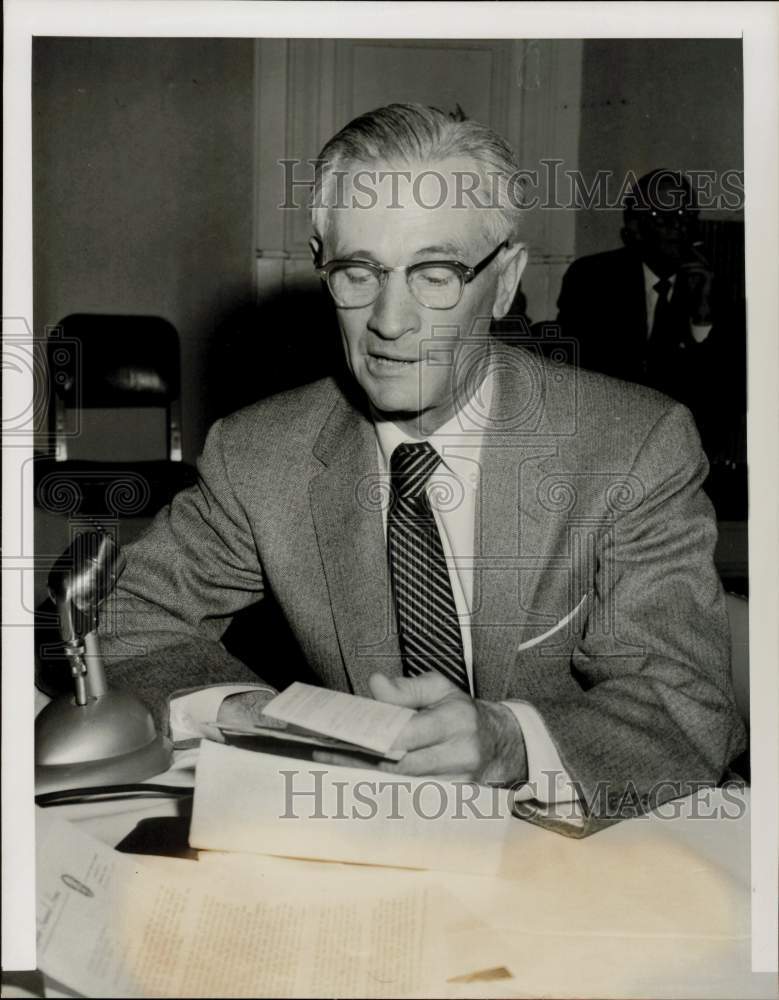 1958 Press Photo Senator Grady Hazelwood reads insurance stockholder letter.- Historic Images