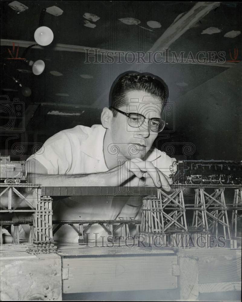 1960 Press Photo David Milton sets up his California-Nevada line railroad models- Historic Images