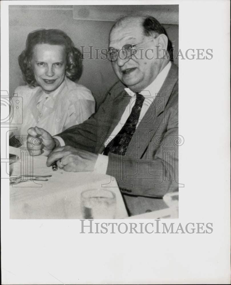 1958 Press Photo Paul Weaver, research geologist, and wife dine at restaurant.- Historic Images