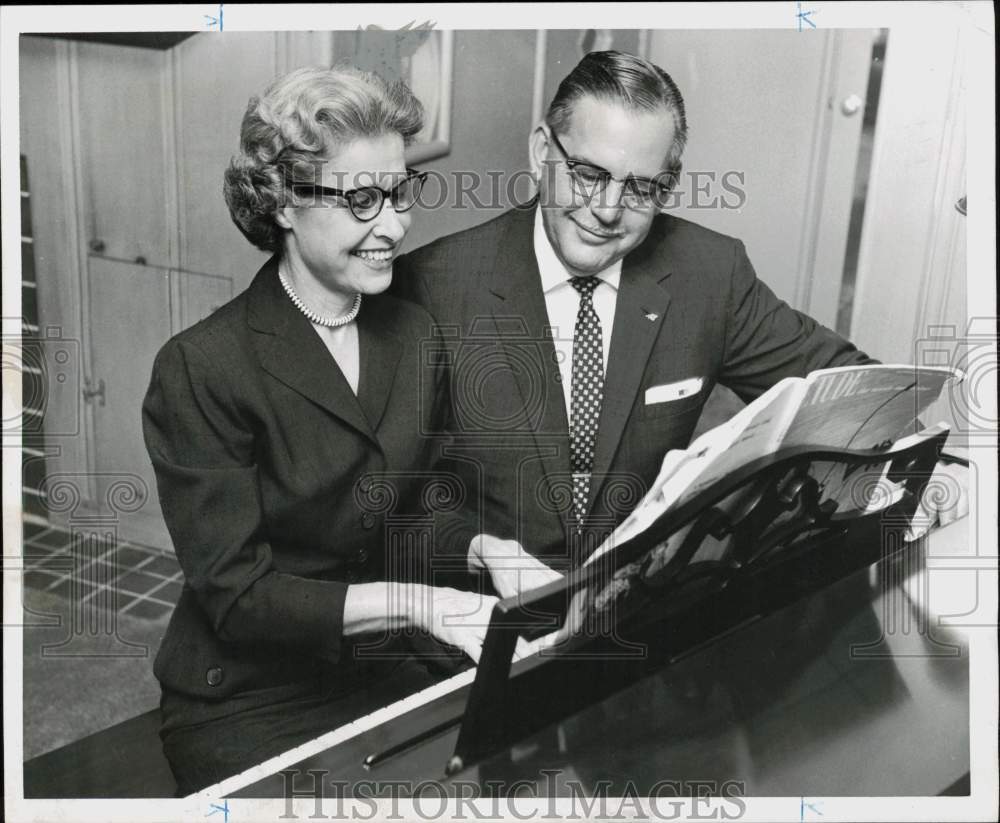 1957 Press Photo Mr. and Mrs. Dixon Hutchinson sit at home piano. - hpa95887- Historic Images