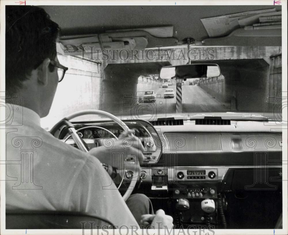 1964 Press Photo Underpass dividing wall looms ahead of driver. - hpa95915- Historic Images