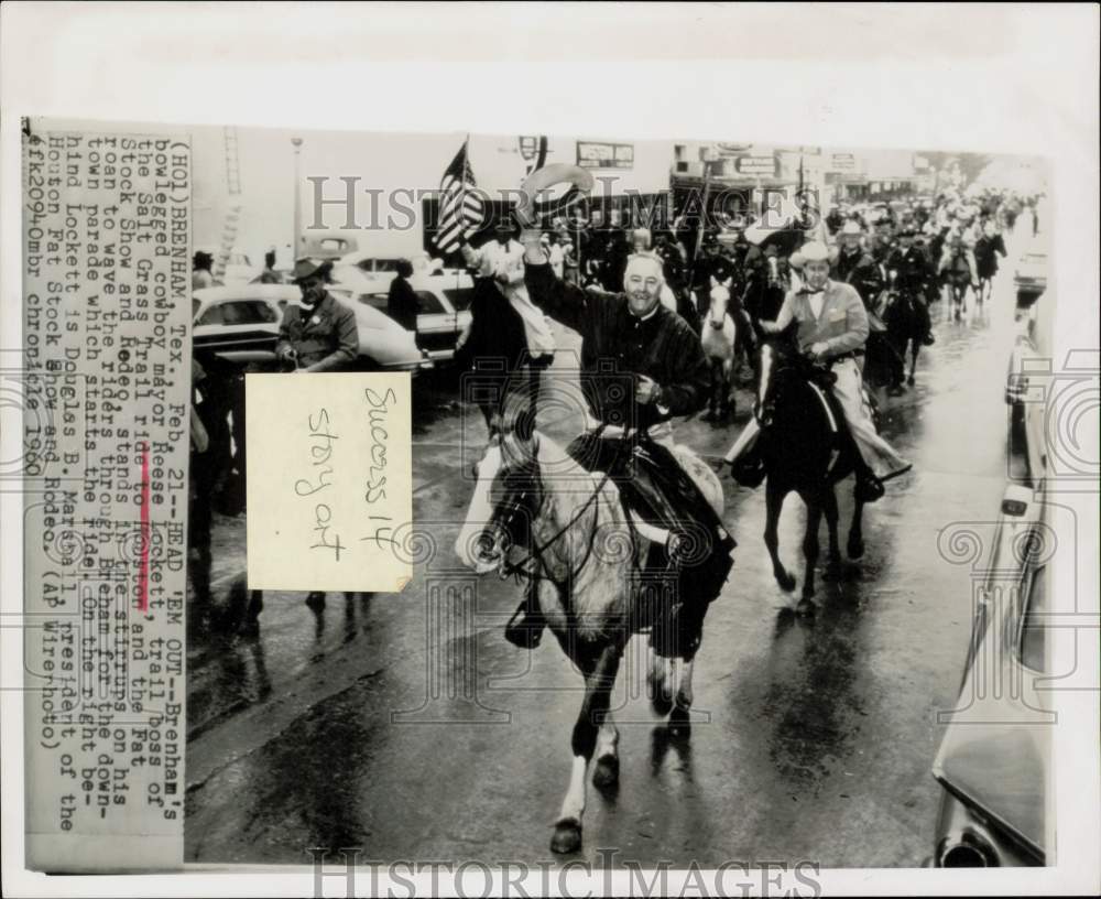 1960 Press Photo Reese Lockett waves Salt Grass Trail Riders through Brenham, TX- Historic Images