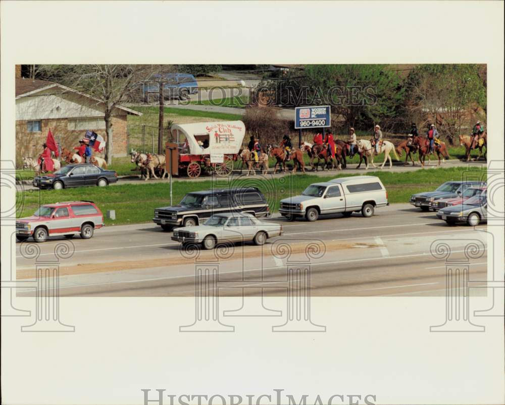 1990 Press Photo Trail Riders move past the Post on Highway 59 near 610.- Historic Images