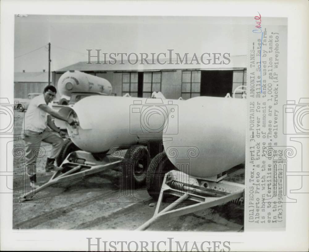 1962 Press Photo Alberto Prieto shows ammonia tanks used by farmers to fertilize- Historic Images