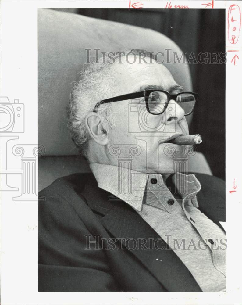 1980 Press Photo Art Buchwald, columnist, smoking cigar - hpb00614- Historic Images