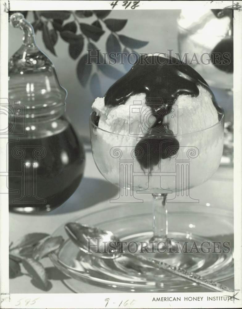 1977 Press Photo Vanilla ice cream covered with hot fudge - hpb01359- Historic Images