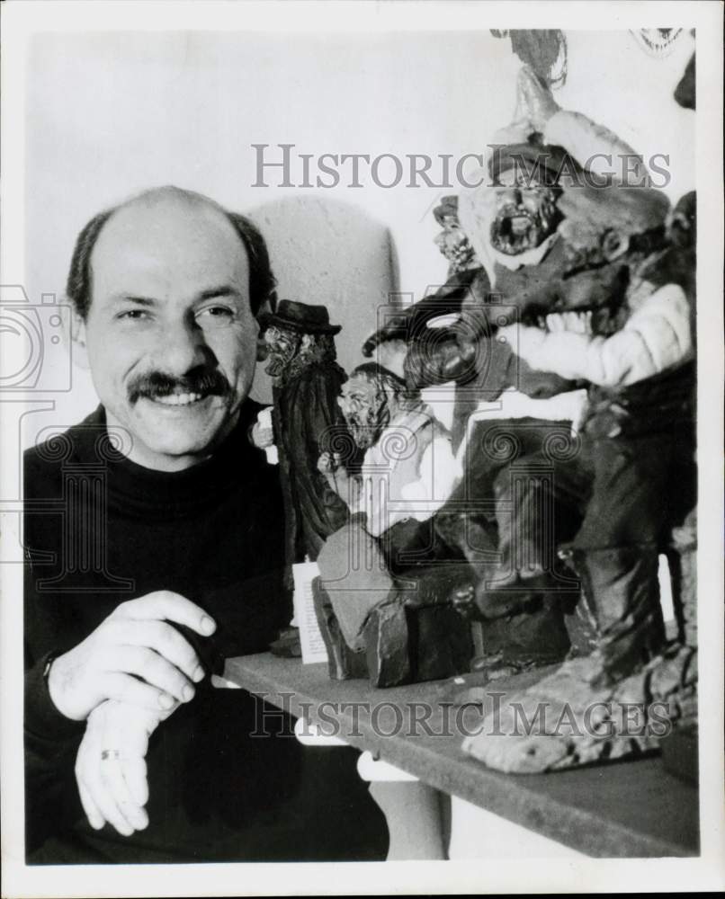 1969 Press Photo Actor Herschel Bernardi poses with brother Sid&#39;s creations.- Historic Images