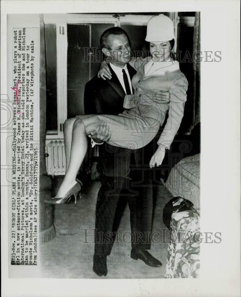 1965 Press Photo Actress Susan Hart Carried by James H. Nicholson in London- Historic Images