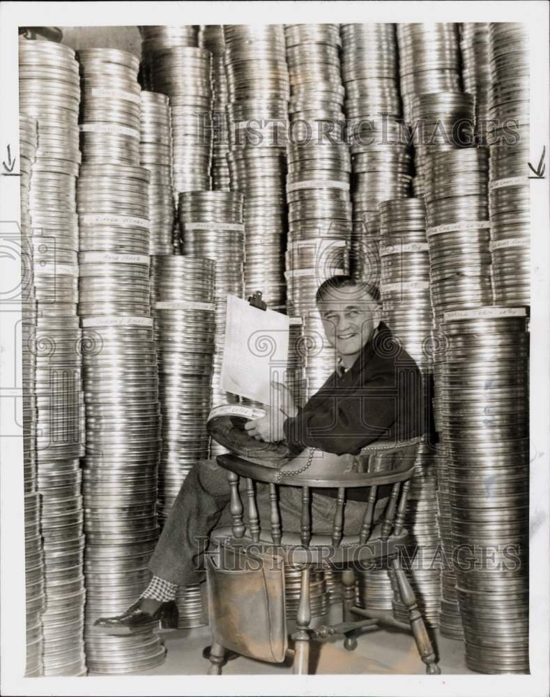 1956 Press Photo Producer Mervyn LeRoy with Giant Stacks of Film Reels- Historic Images