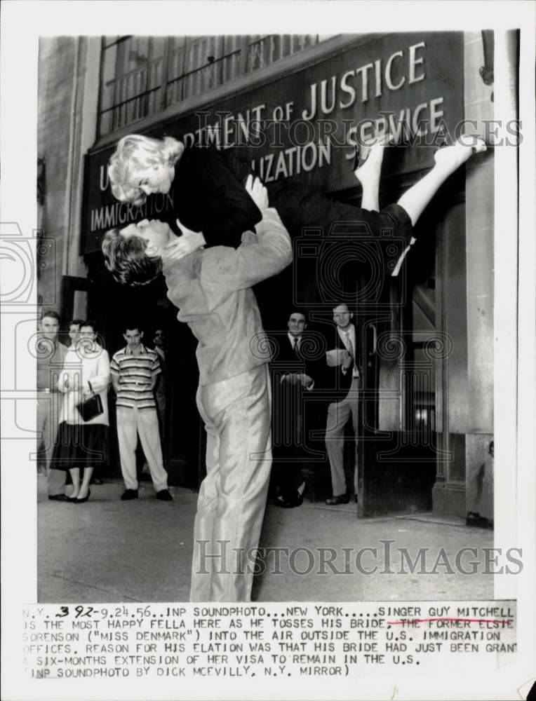 1956 Press Photo Singer Guy Mitchell Tosses Wife Elsie Sorenson in New York- Historic Images