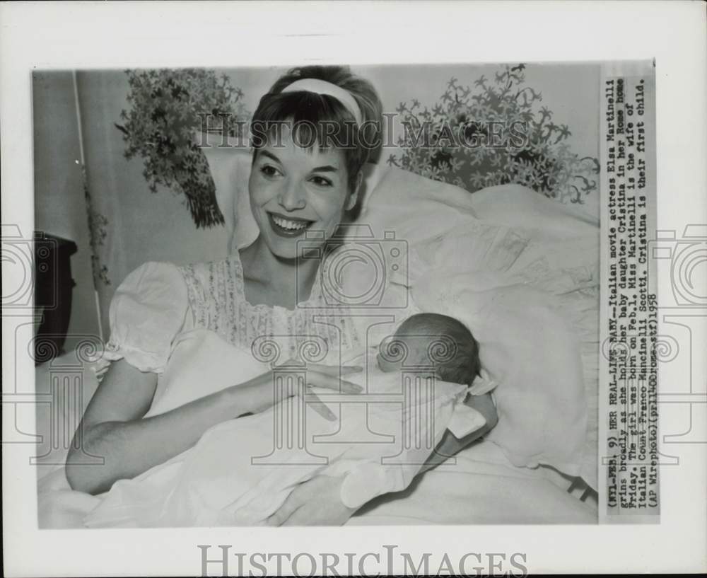 1958 Press Photo Actress Elsa Martinelli Holds Newborn Daughter Cristine in Rome- Historic Images