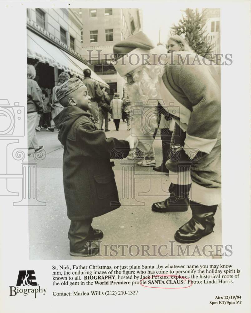 1994 Press Photo Santa Claus Greets Child on A&E Biography - hpp34667- Historic Images