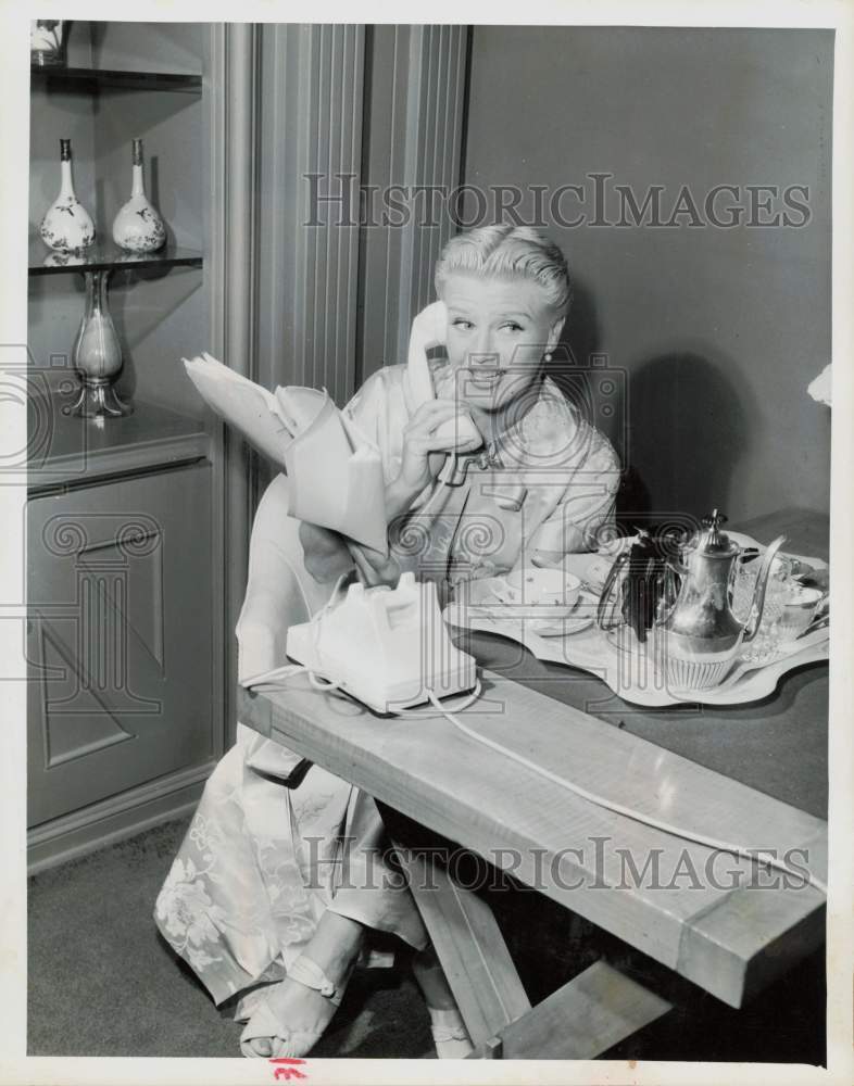 1959 Press Photo Ginger Rogers, actress, dancer and singer, on the telephone- Historic Images