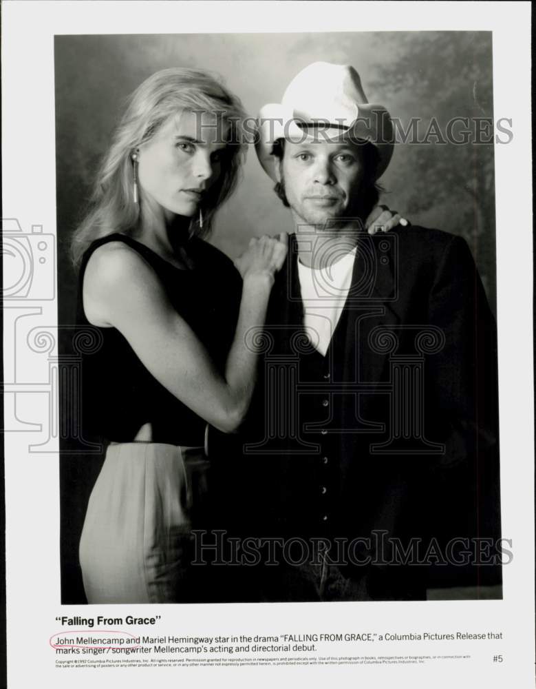 1992 Press Photo John Mellencamp, Mariel Hemingway in &quot;Falling from Grace&quot;- Historic Images