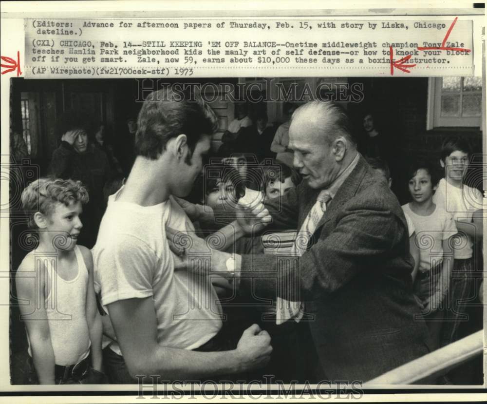 1973 Press Photo Boxer Boxer Tony Zale teaches kids self-defense in Chicago- Historic Images