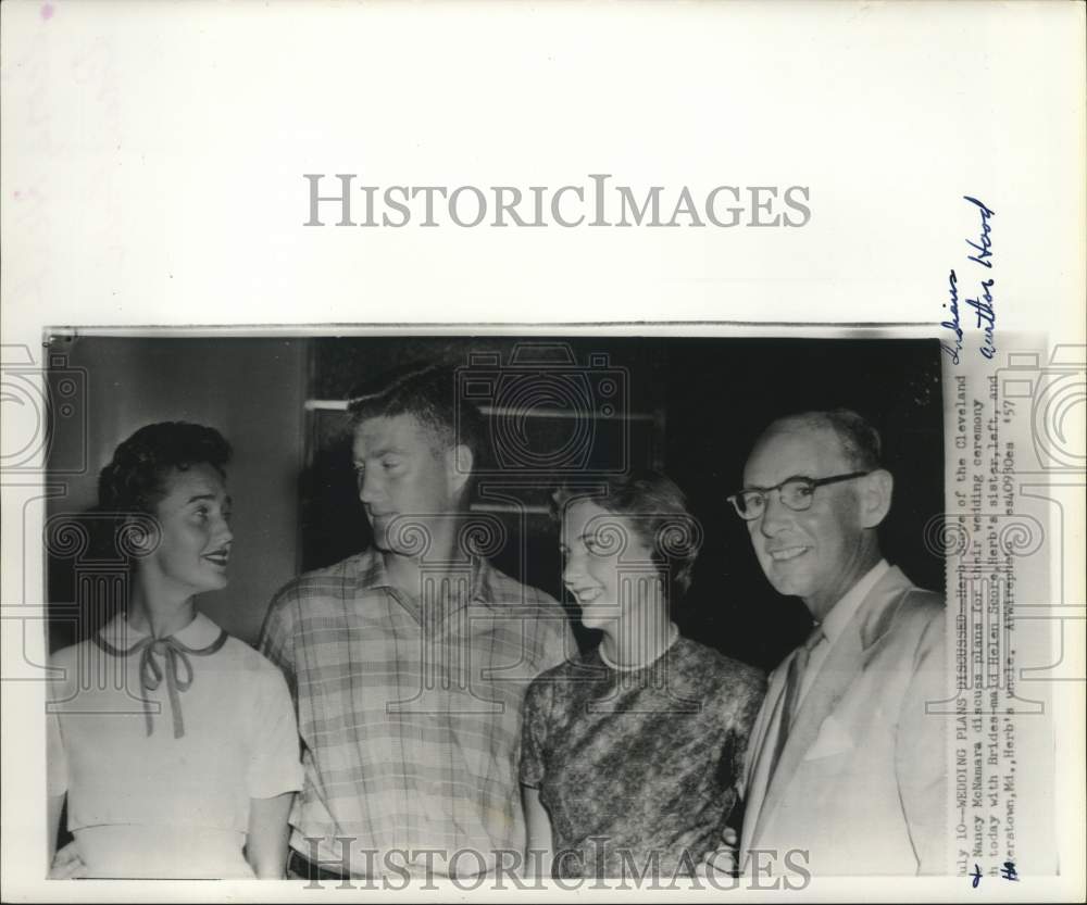 1957 Press Photo Herb Score, Nancy McNamara and family discuss wedding plans.- Historic Images