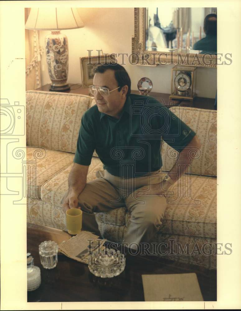 1988 Press Photo Fred Burns, ex-Little Leaguer relaxes at his home. - hps01914- Historic Images