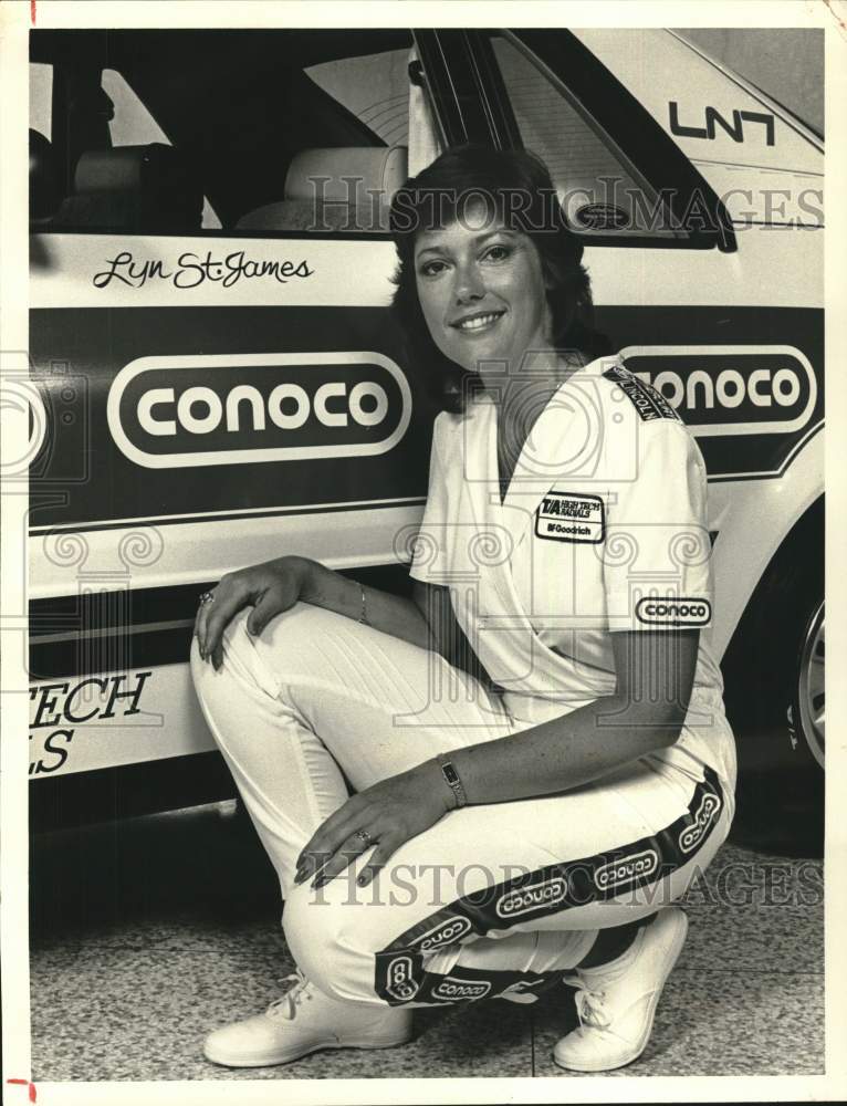 1981 Press Photo Race car driver Lyn St. James near her Conoco/Goodrich car.- Historic Images