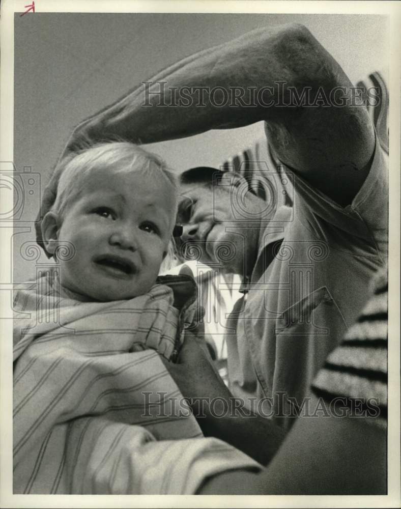 1973 Press Photo Zachary cries while getting his first haircut. - hps07823- Historic Images