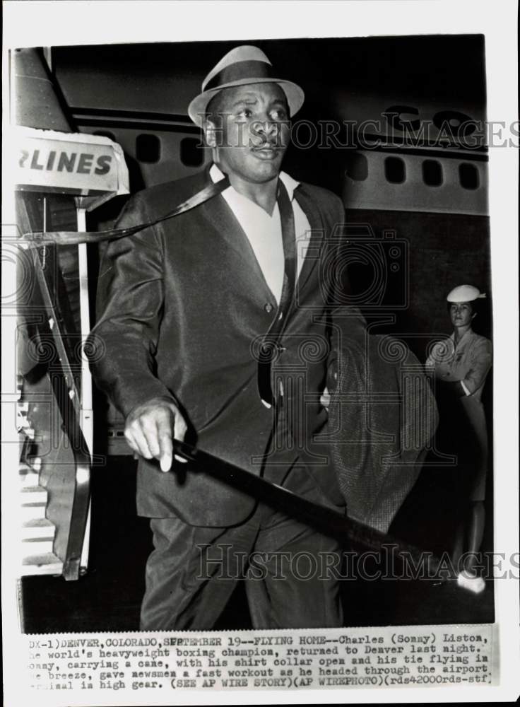 1963 Press Photo Boxer Charles (Sonny) Liston in Denver, Colorado at Airport- Historic Images