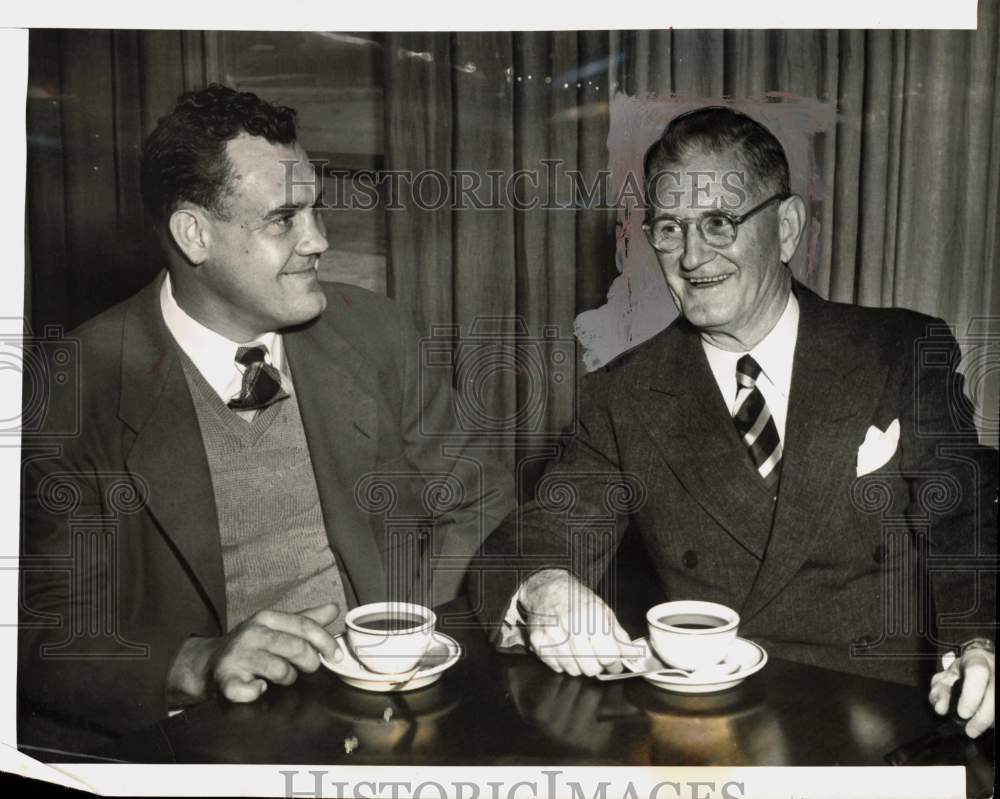 1966 Press Photo Ray Morrison drinks coffee with Man - hps09797- Historic Images